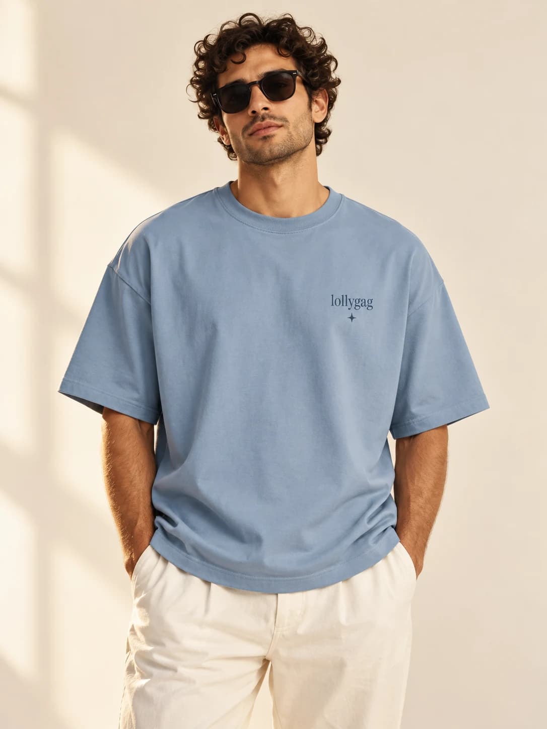 The hallucination society — model wearing Dusty blue tee, front