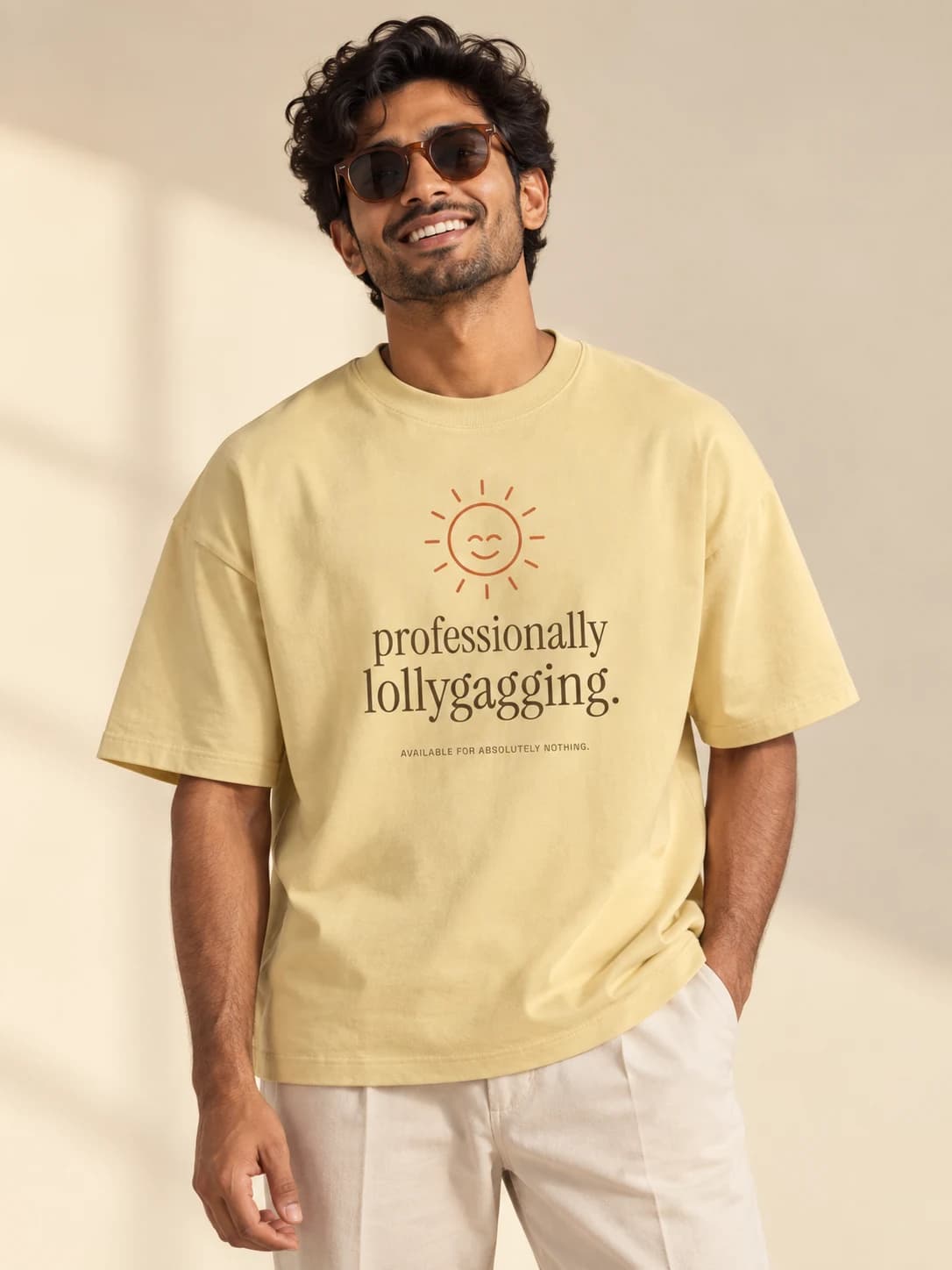 Professionally lollygagging — model wearing Butter tee, front